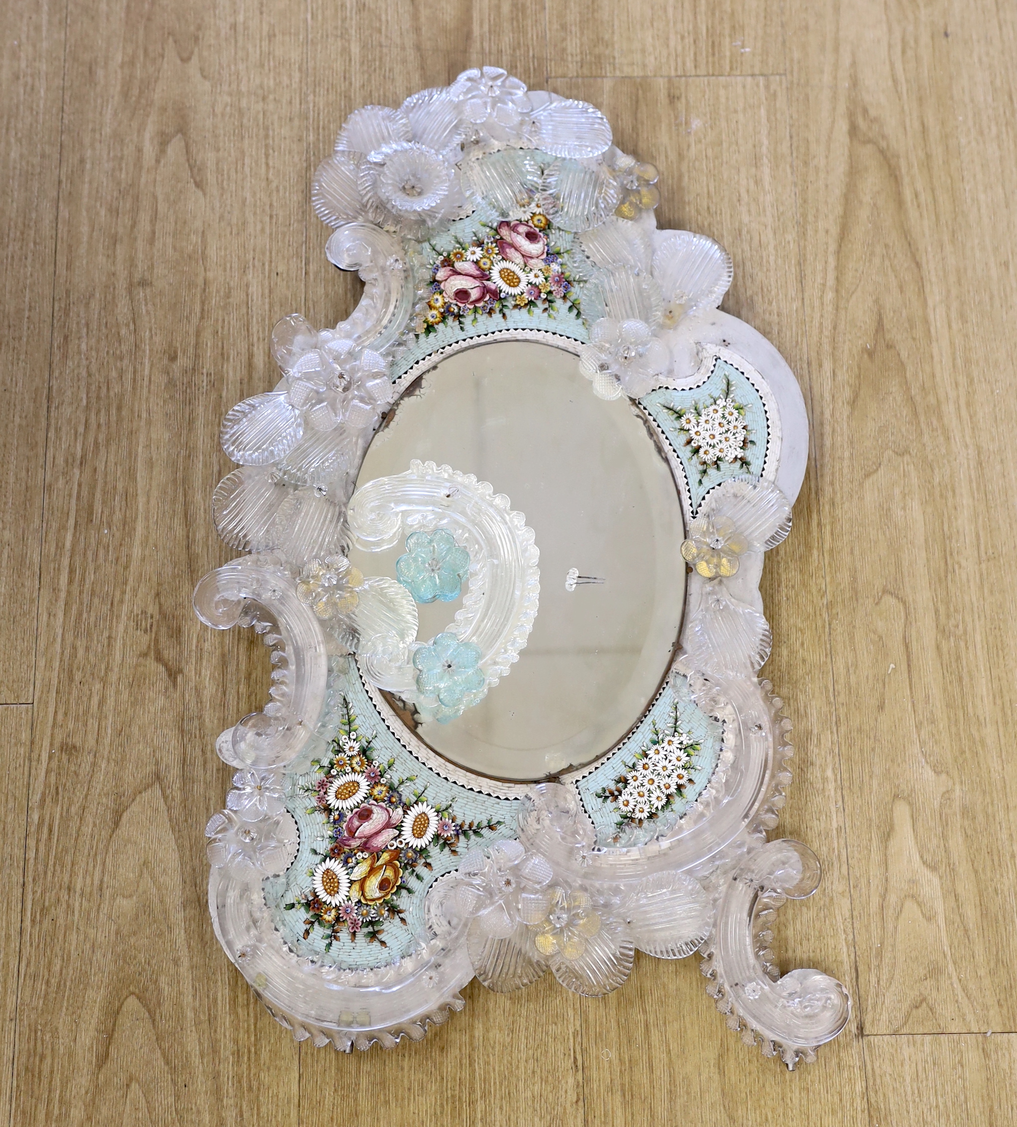 A Venetian micro-mosaic and glass framed wall mirror 65cm high